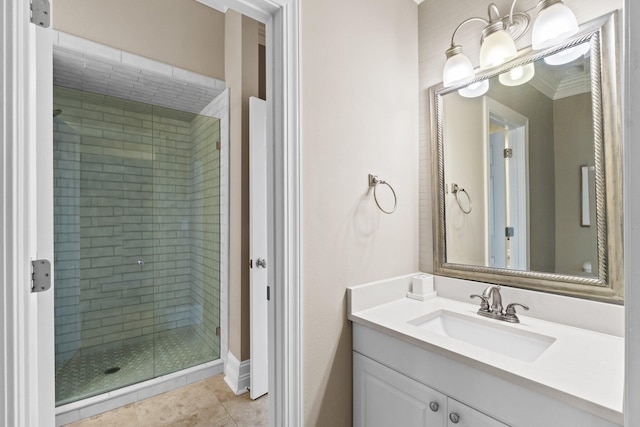 bathroom featuring crown molding, an enclosed shower, tile patterned floors, and vanity