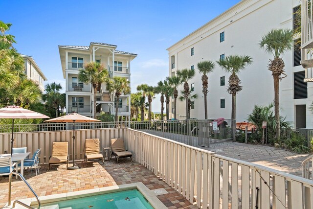 view of swimming pool featuring a patio