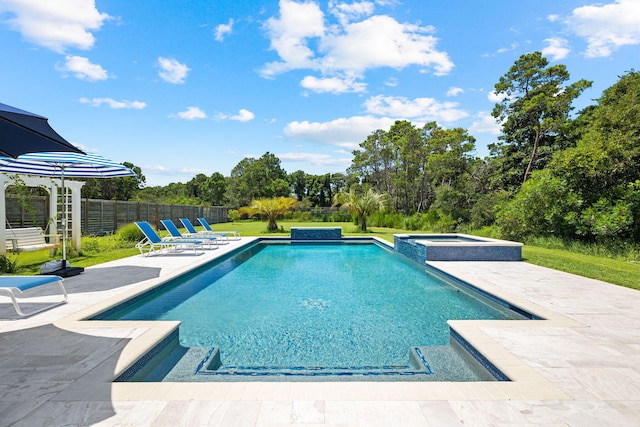 view of pool with an in ground hot tub and a patio area