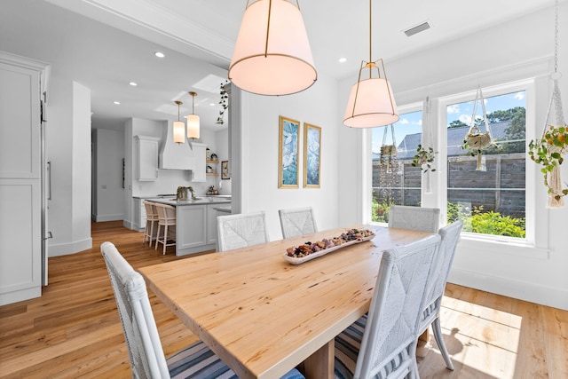 dining room featuring light wood-type flooring