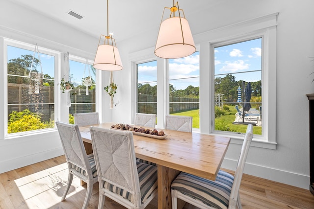 dining room featuring light hardwood / wood-style flooring