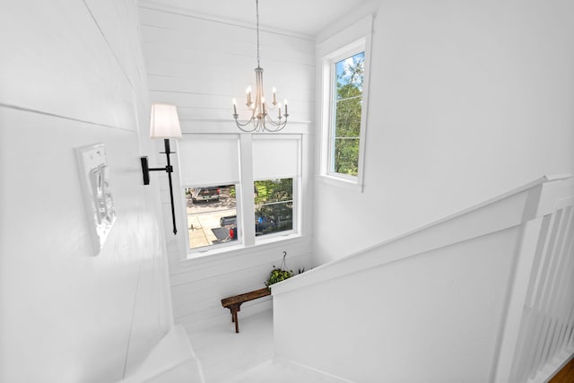 interior space with a notable chandelier and a healthy amount of sunlight