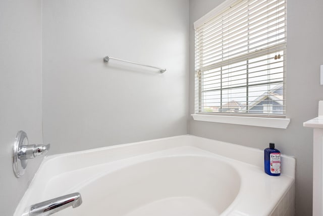 full bathroom featuring a garden tub
