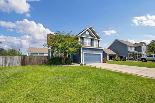 view of front of house featuring a front yard and a garage