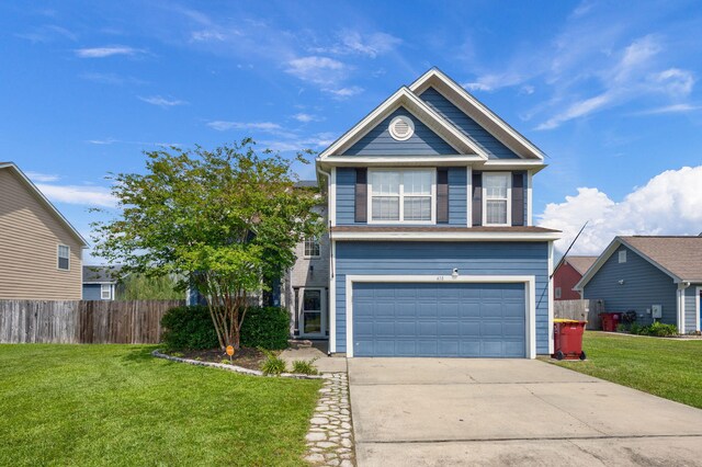 traditional home with driveway, a garage, fence, and a front yard