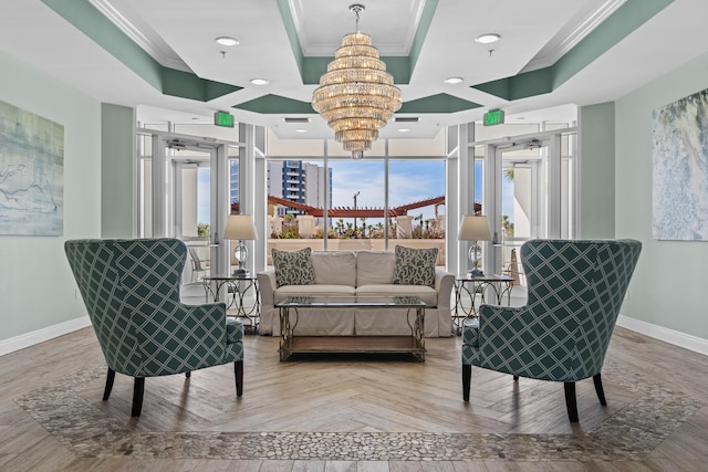 15100 Emerald Coast Pkwy Ph 2, Destin, FL 32541 - living area featuring an inviting chandelier, baseboards, a tray ceiling, and crown molding