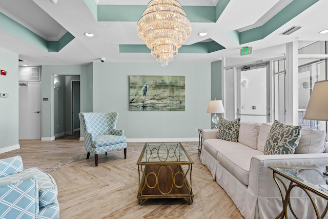 15100 Emerald Coast Pkwy Ph 2, Destin, FL 32541 - living area with a notable chandelier, recessed lighting, visible vents, baseboards, and parquet flooring