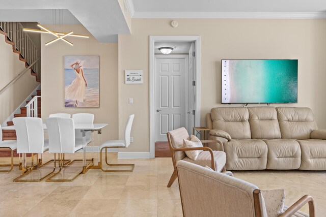 15100 Emerald Coast Pkwy Ph 2, Destin, FL 32541 - living room featuring stairs, baseboards, a chandelier, and crown molding