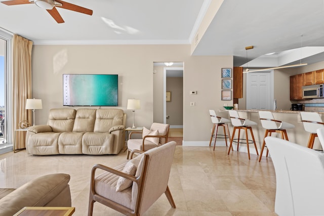 15100 Emerald Coast Pkwy Ph 2, Destin, FL 32541 - living area with marble finish floor, crown molding, baseboards, and ceiling fan