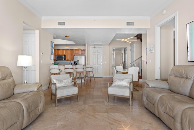 15100 Emerald Coast Pkwy Ph 2, Destin, FL 32541 - living room with ornamental molding, visible vents, and baseboards