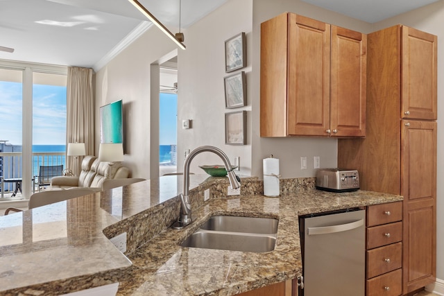 15100 Emerald Coast Pkwy Ph 2, Destin, FL 32541 - kitchen with dishwasher, open floor plan, a water view, crown molding, and a sink