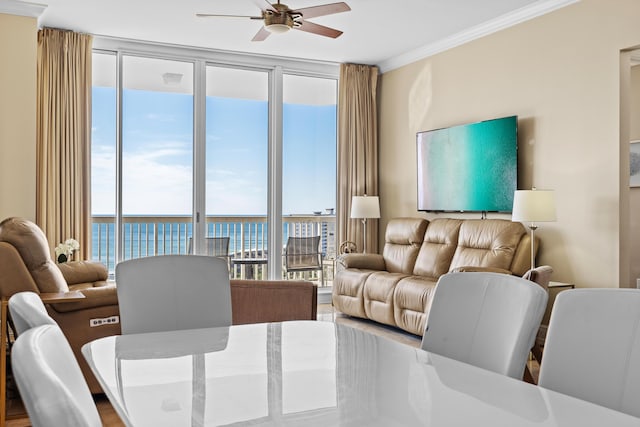 15100 Emerald Coast Pkwy Ph 2, Destin, FL 32541 - dining area featuring a ceiling fan and crown molding