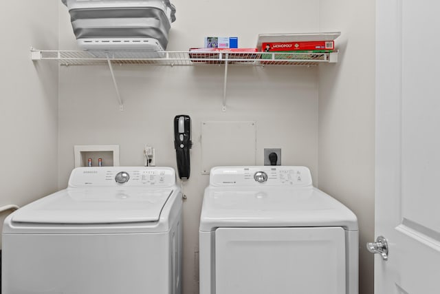 15100 Emerald Coast Pkwy Ph 2, Destin, FL 32541 - washroom with laundry area and independent washer and dryer