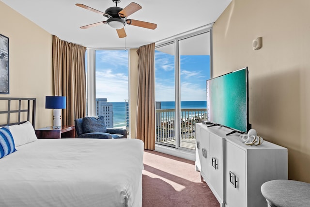 15100 Emerald Coast Pkwy Ph 2, Destin, FL 32541 - carpeted bedroom with access to exterior, floor to ceiling windows, and a ceiling fan