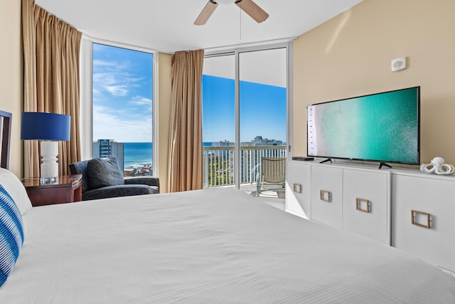 15100 Emerald Coast Pkwy Ph 2, Destin, FL 32541 - bedroom featuring access to exterior, floor to ceiling windows, and a ceiling fan