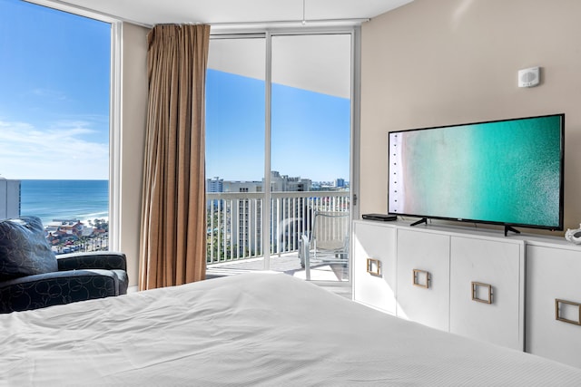15100 Emerald Coast Pkwy Ph 2, Destin, FL 32541 - bedroom featuring a wall of windows, access to outside, and a water view