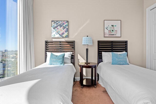 15100 Emerald Coast Pkwy Ph 2, Destin, FL 32541 - bedroom featuring light colored carpet and baseboards