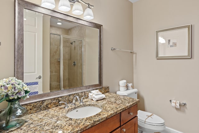 15100 Emerald Coast Pkwy Ph 2, Destin, FL 32541 - bathroom featuring toilet, a shower stall, and vanity