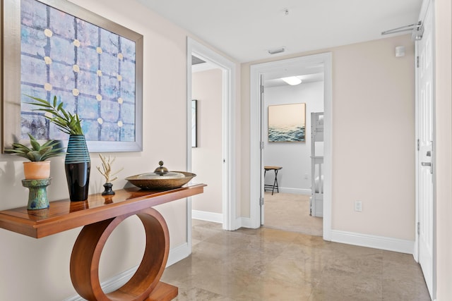 15100 Emerald Coast Pkwy Ph 2, Destin, FL 32541 - hallway featuring visible vents and baseboards