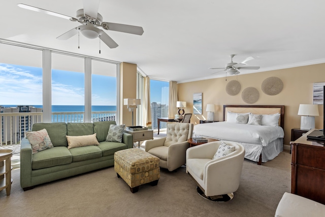 15100 Emerald Coast Pkwy Ph 2, Destin, FL 32541 - carpeted bedroom featuring a ceiling fan, a water view, crown molding, and a wall of windows