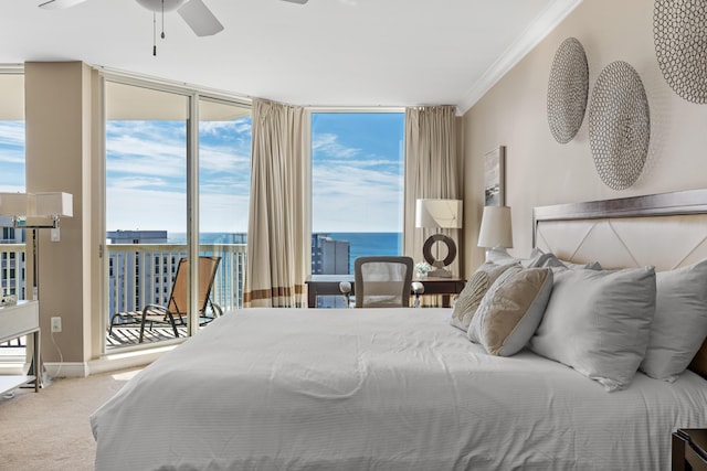 15100 Emerald Coast Pkwy Ph 2, Destin, FL 32541 - bedroom with a water view, access to exterior, crown molding, carpet floors, and floor to ceiling windows