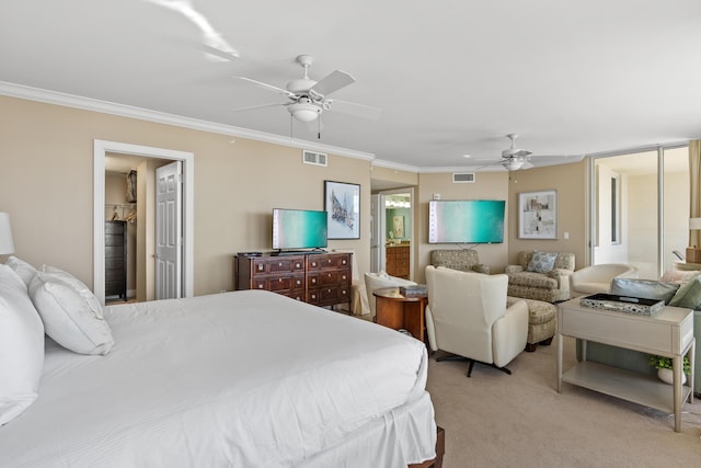15100 Emerald Coast Pkwy Ph 2, Destin, FL 32541 - bedroom with light carpet, visible vents, a walk in closet, and crown molding