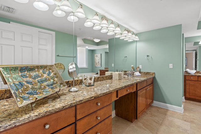 15100 Emerald Coast Pkwy Ph 2, Destin, FL 32541 - full bathroom with visible vents, vanity, and baseboards