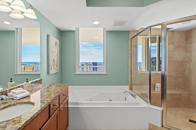 15100 Emerald Coast Pkwy Ph 2, Destin, FL 32541 - bathroom featuring recessed lighting, visible vents, a shower stall, vanity, and a whirlpool tub