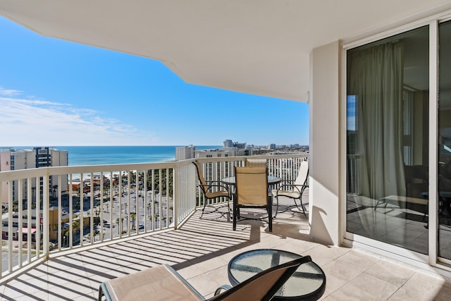 15100 Emerald Coast Pkwy Ph 2, Destin, FL 32541 - balcony featuring a water view and outdoor dining space