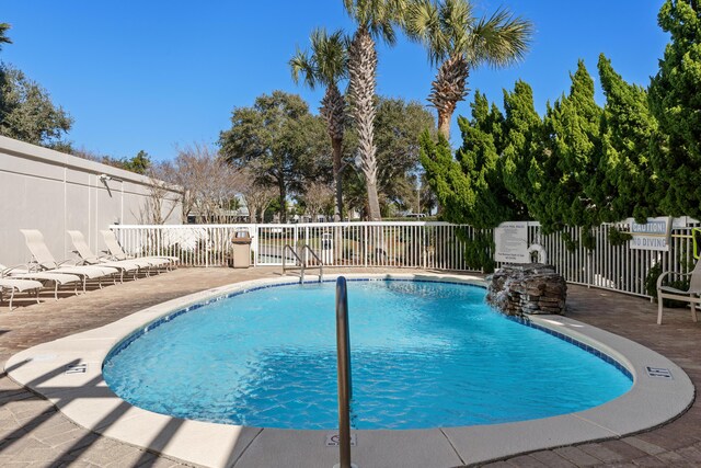 15100 Emerald Coast Pkwy Ph 2, Destin, FL 32541 - pool featuring a patio area and fence