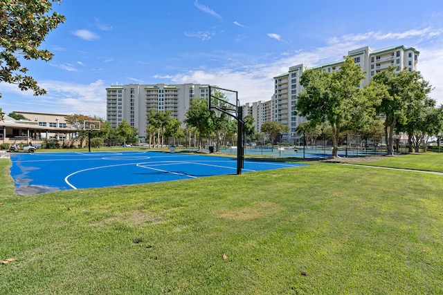 15100 Emerald Coast Pkwy Ph 2, Destin, FL 32541 - view of basketball court with community basketball court, fence, and a lawn