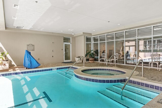 15100 Emerald Coast Pkwy Ph 2, Destin, FL 32541 - community pool featuring an indoor in ground hot tub