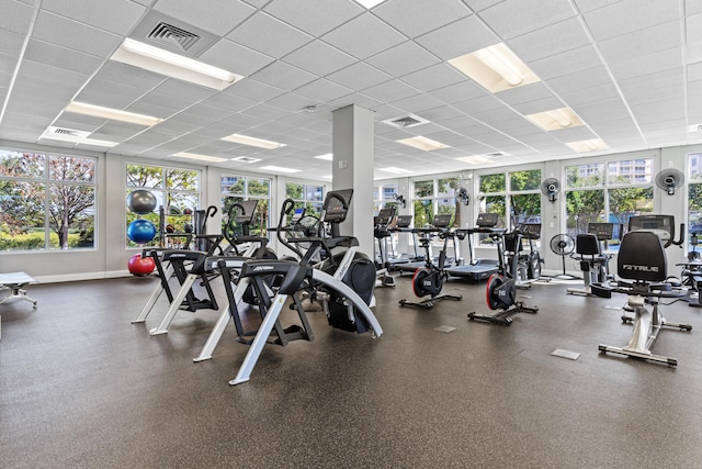 15100 Emerald Coast Pkwy Ph 2, Destin, FL 32541 - workout area with a paneled ceiling, visible vents, and baseboards