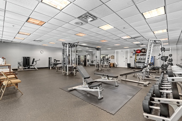 15100 Emerald Coast Pkwy Ph 2, Destin, FL 32541 - exercise room featuring baseboards, visible vents, and a drop ceiling