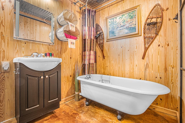 bathroom with wood walls and vanity