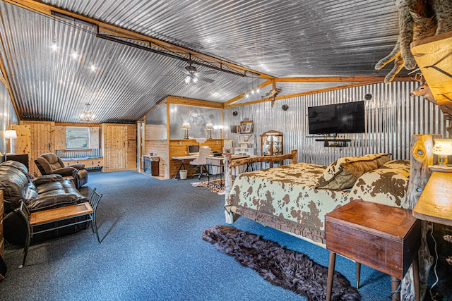 carpeted bedroom featuring wooden walls and lofted ceiling