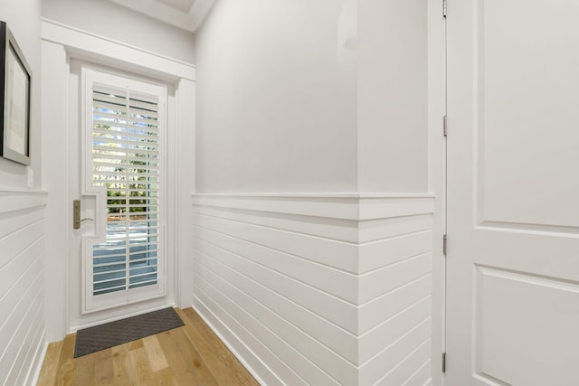 doorway to outside with light hardwood / wood-style flooring