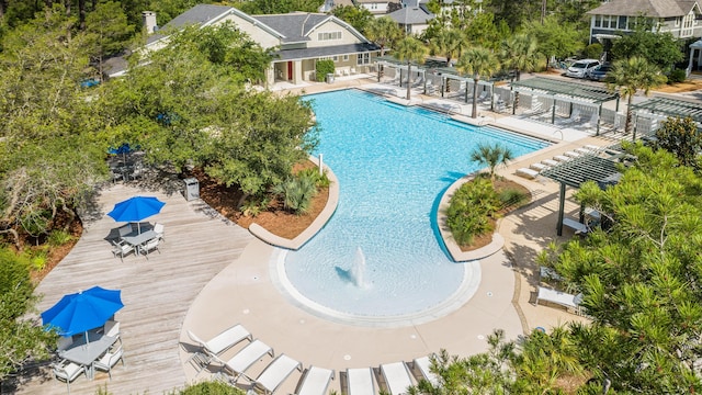 view of swimming pool featuring a patio area