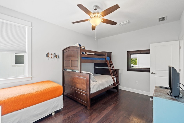 bedroom featuring dark hardwood / wood-style floors and ceiling fan