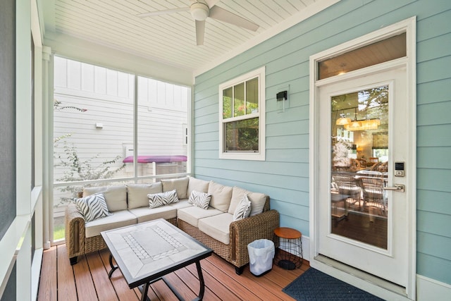 sunroom / solarium with ceiling fan