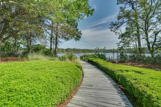 view of community with a water view