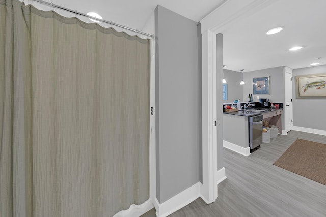 bathroom featuring vanity and hardwood / wood-style flooring