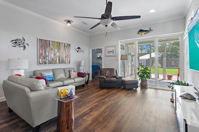 living room with ceiling fan, ornamental molding, and dark hardwood / wood-style flooring