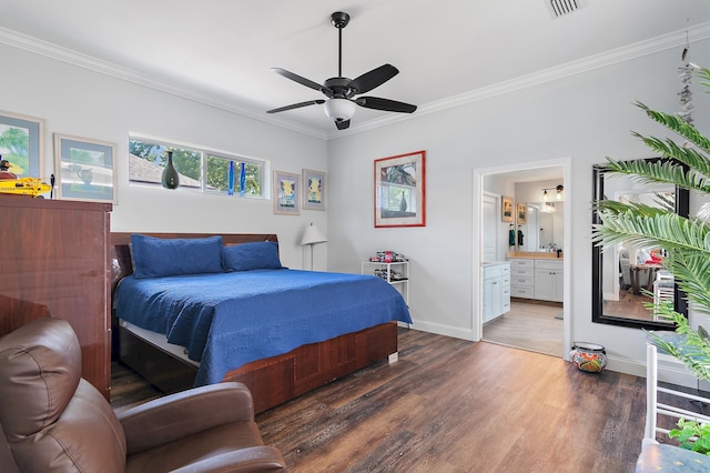 bedroom with ceiling fan, connected bathroom, hardwood / wood-style floors, and ornamental molding