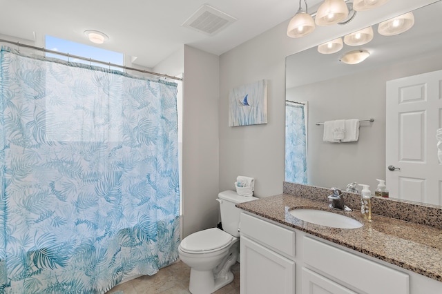 full bathroom with visible vents, toilet, tile patterned floors, curtained shower, and vanity