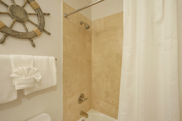 bathroom featuring shower / tub combo