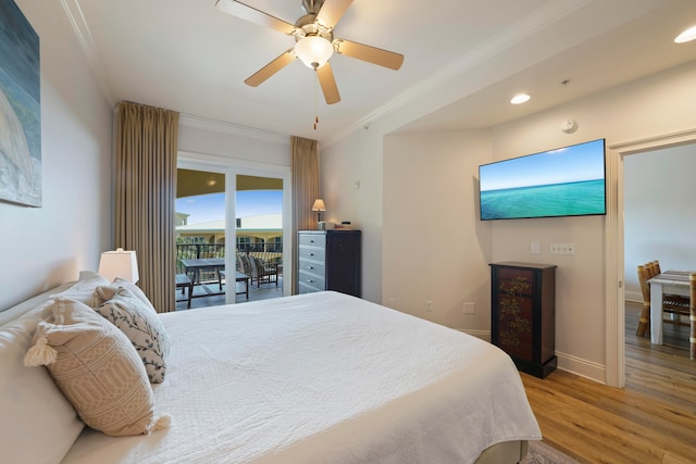 bedroom with hardwood / wood-style floors, access to exterior, crown molding, and ceiling fan