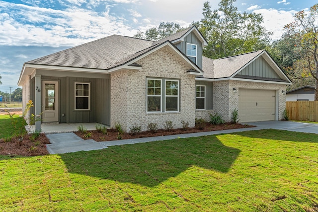 76 Azalea Dr, Freeport, FL 32439 - view of front facade with board and batten siding, driveway, an attached garage, roof with shingles, and a porch