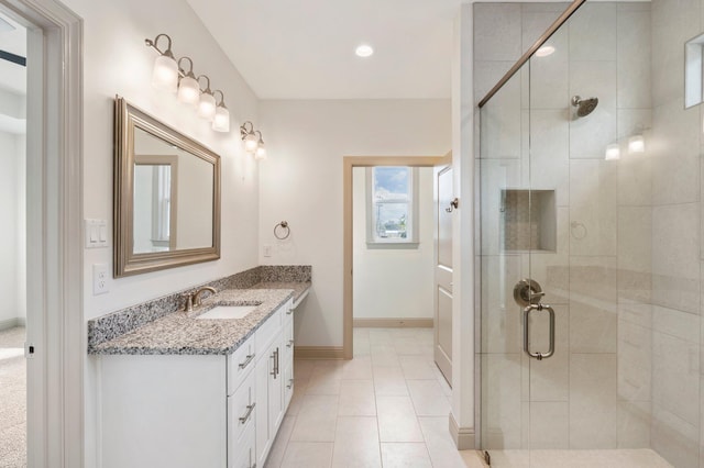76 Azalea Dr, Freeport, FL 32439 - full bathroom with vanity, a shower stall, baseboards, tile patterned flooring, and recessed lighting
