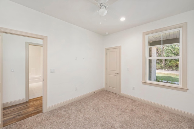 76 Azalea Dr, Freeport, FL 32439 - unfurnished room featuring light colored carpet, baseboards, and ceiling fan